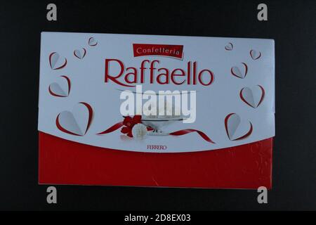 Raffaello candy box on black background side or top view gift for new year Christmas mother's day birthday Stock Photo