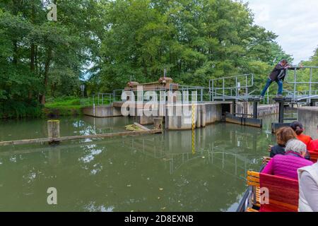 Punt boat tour through the Spree Forest entering a lock, Oberspreewald, Brandenburg, East Germany, Europe Stock Photo