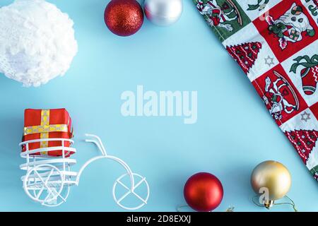 Xmas, winter, new year concept - layout white plate on which there are three Christmas trees cut from sausage cheese bread with santa hat and golden Stock Photo