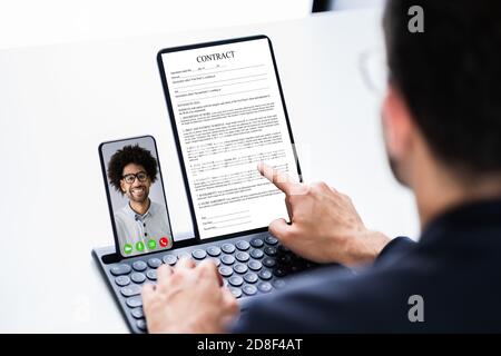 Online Video Conference Business Meeting About Contract Stock Photo