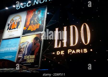 Lido de Paris logo and movies posters on famous cabaret facade on Champs Elysées in Paris Stock Photo