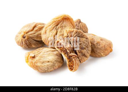 Dried figs and dried figs cut in half on a white background Stock Photo