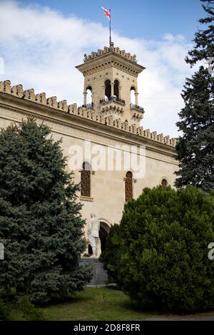 A Georgian flag flies over the Joseph Stalin Museum in Gori, Georgia, Caucasus, Europe, where the former Soviet ruler was born. Stock Photo