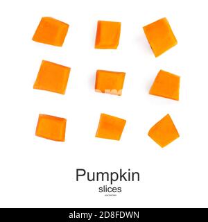 Creative layout made of Pumpkin pieces cut in a cube slice isolated on white background. Diced Pumpkin, close up. Stock Photo