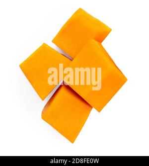 Pumpkin vegetable cube slices and seeds  isolated on white background. Top view. Autumn Pumpkins  chunks close-up Stock Photo