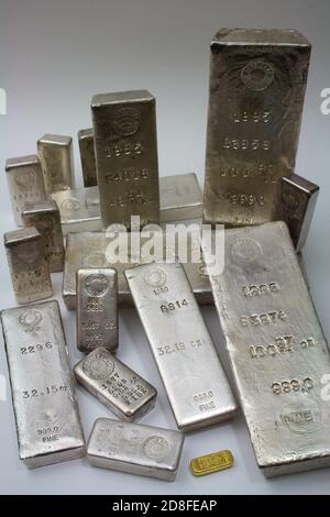 Homestake Mining Company silver bullion bars. Now closed mine located at Lead, South Dakota - Black Hills, USA. One ounce gold bar in foreground.