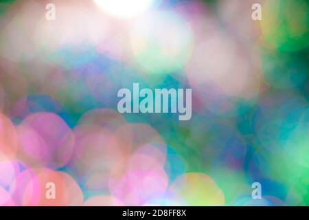 light colored blurry round spots of warm shades for a pale greenish background Stock Photo