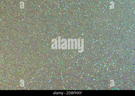 Full frame macro abstract background of sparkling sea foam blue glitter texture with bokeh and copy space Stock Photo