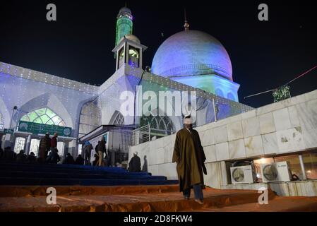 Srinagar, India. 30th Oct, 2020. A man seeln leaving the Hazratbal Shrine on the eve of Eid-Milad-un-Nabi in Srinagar.Amid Coronavirus pandemic thousands of Muslim devotees gathered at the Hazratbal shrine in summer capital Srinagar, which houses a relic believed to be a hair from the beard of Prophet Muhammed, to offer special prayers on the occasion of the Eid-e-Milad-un-Nabi, the birth anniversary of Islamic Prophet Muhammad PBUH. Credit: SOPA Images Limited/Alamy Live News Stock Photo