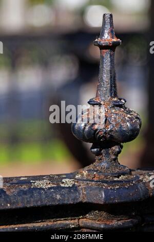 metal knob on railing to family grave Stock Photo