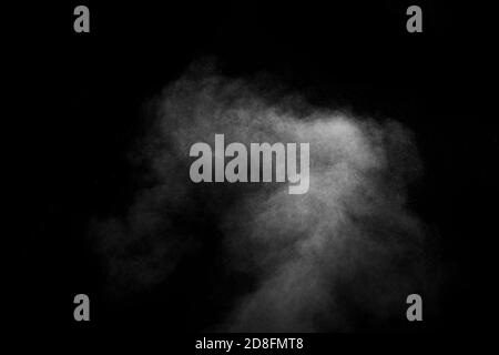 Abstract steam with dots of spray moves on a black background. Figured smoke can be used for design Stock Photo