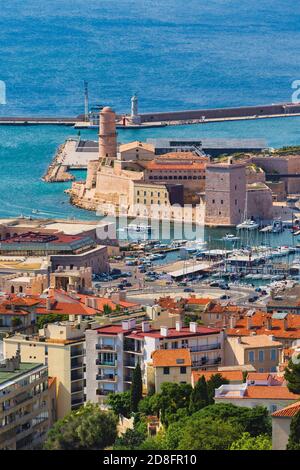 Marseille, Provence-Alpes-Côte d'Azur, France.  View down to the entrance of Vieux-Port, the Old Port, and the 17th century Fort Saint-Jean. Stock Photo