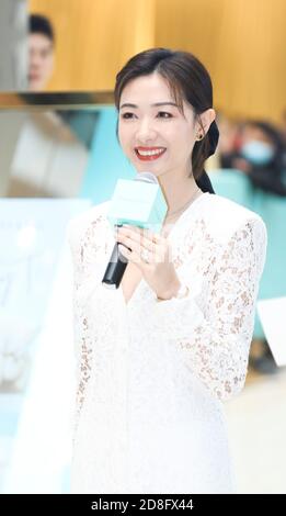 Chinese actress and singer Wan Qian shows up in white dress, showing off beauty at a promotional event, Shanghai, China, 24 September 2020. Stock Photo