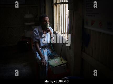 Rohingya refugee is seen at hospital at Kutupalong camp on January 17, 2018 in Cox's Bazar, Bangladesh. In November 2017 there were 7 named camps in Kutupalong, now there are 20 and there are now approximately 600,000 Rohingya refugees in the Kutupalong refugee camp of Southern Bangladesh. While preparations are now being made for the Monsoon season which is fast approaching. Stock Photo