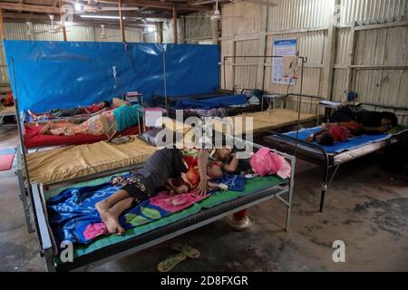 Rohingya refugee is seen at hospital at Kutupalong camp on January 17, 2018 in Cox's Bazar, Bangladesh. In November 2017 there were 7 named camps in Kutupalong, now there are 20 and there are now approximately 600,000 Rohingya refugees in the Kutupalong refugee camp of Southern Bangladesh. While preparations are now being made for the Monsoon season which is fast approaching. Stock Photo