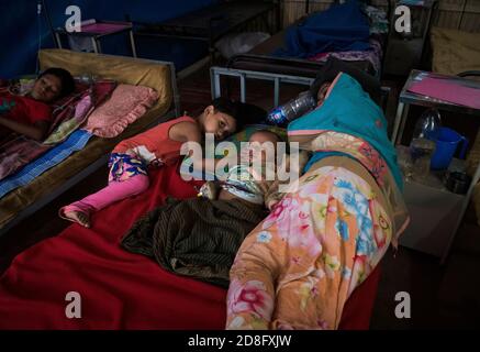 Rohingya refugee is seen at hospital at Kutupalong camp on January 17, 2018 in Cox's Bazar, Bangladesh. In November 2017 there were 7 named camps in Kutupalong, now there are 20 and there are now approximately 600,000 Rohingya refugees in the Kutupalong refugee camp of Southern Bangladesh. While preparations are now being made for the Monsoon season which is fast approaching. Stock Photo