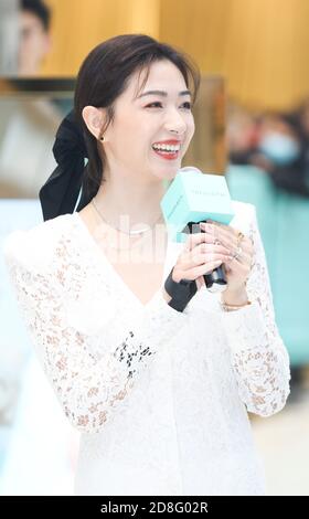 Chinese actress and singer Wan Qian shows up in white dress, showing off beauty at a promotional event, Shanghai, China, 24 September 2020. Stock Photo