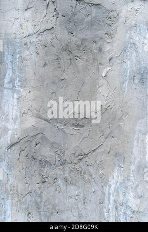 Cracks in the old plastered wall. Abstract background Stock Photo