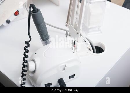 Close up photo of machine for brushing nails, Machine for removing gel from nails. Stock Photo