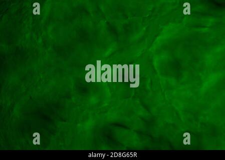 Abstract green background with blurry texture. Color spots on an empty surface Stock Photo
