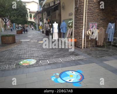 View of the manhole covers with cartoon paintings at Chengxi Street near Chongqing University in Chongqing, China, 25 September 2020. Stock Photo