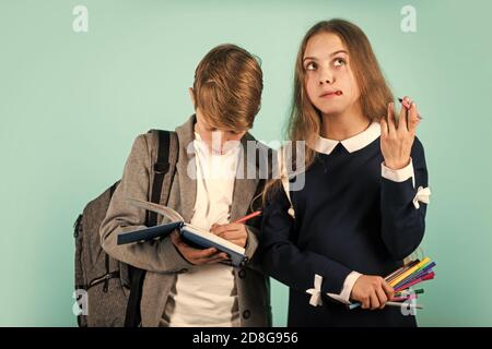 Study together. Student ready for lessons. Regular school program. School education for advanced level. Easy learning concept. International students exchange. School knowledge. Talent development. Stock Photo