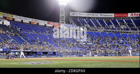 A baseball game between the DeNA BayStars and the Hanshin Tigers is played  at Yokohama Stadium on Nov. 1, 2020, the last day of a three-day trial to  study ways to mitigate