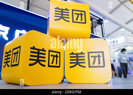 In this unlocated photo, the logo of Meituan, a Chinese shopping platform for locally found consumer products and retail services, is seen at an exhib Stock Photo