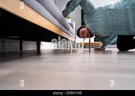 Lost Something Looking For Things. Searching Keys Stock Photo