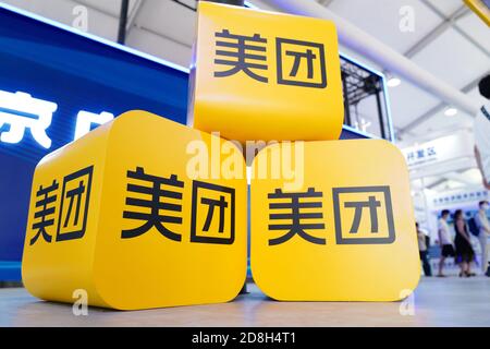 In this unlocated photo, the logo of Meituan, a Chinese shopping platform for locally found consumer products and retail services, is seen at an exhib Stock Photo