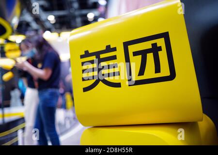 In this unlocated photo, the logo of Meituan, a Chinese shopping platform for locally found consumer products and retail services, is seen at an exhib Stock Photo