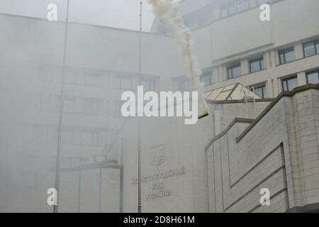Kyiv, Ukraine. 30th Oct, 2020. Burning fires during picket the building of the Constitutional Court of Ukraine after its decision to cancel the electronic declaration by officials. (Photo by Aleksandr Gusev/Pacific Press) Credit: Pacific Press Media Production Corp./Alamy Live News Stock Photo