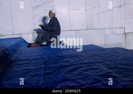 Srinagar, India. 30th Oct, 2020. An old Kashmiri Muslim prays at Hazratbal Shrine during Eid-e-Milad the anniversary of the birth of the Prophet Mohammed in Srinagar, the summer capital of Indian administered Kashmir. (Photo by Adil Abass/Pacific Press) Credit: Pacific Press Media Production Corp./Alamy Live News Stock Photo