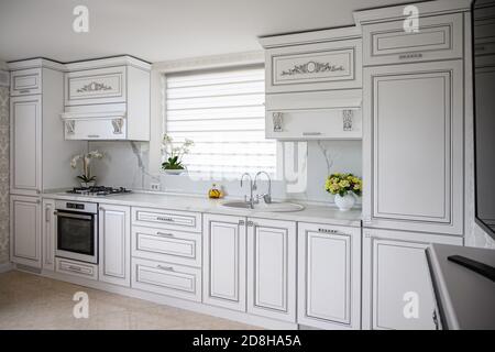 Luxury modern classic white kitchen interior Stock Photo