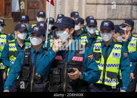 Police wearing masks during the Coronavirus pandemic, Seoul, South Korea Stock Photo