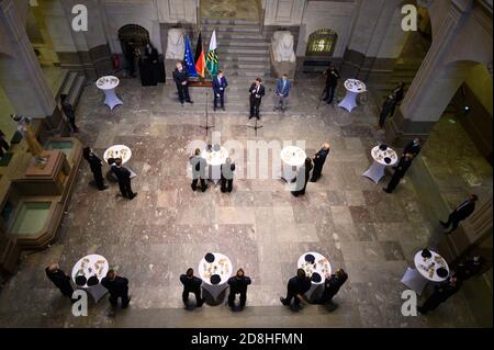 Dresden, Germany. 30th Oct, 2020. Participants and guests will be standing in the State Chancellery at a ceremony for the last training course in the Saxonian guard police. Credit: Sebastian Kahnert/dpa-Zentralbild/ZB/dpa/Alamy Live News Stock Photo