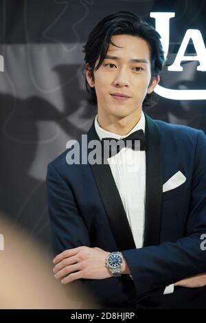 Chinese actor Jing Boran attends the global grand opening ceremony of ...