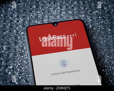 Lod, Israel - July 8, 2020: LastPass Password Manager app launch screen with logo on the display of a black mobile smartphone on a metallic background Stock Photo