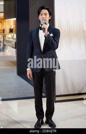 Chinese actor Jing Boran attends the global grand opening ceremony of ...