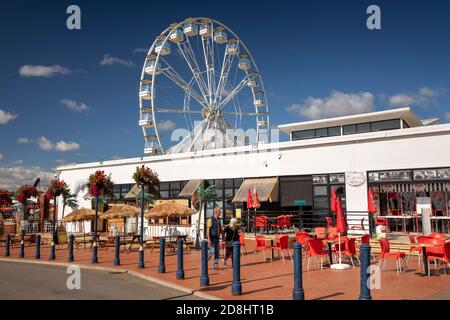 UK, Wales, Glamorgan, Barry Island, Friars Road, Teddy T’s restaurant in front of funfair