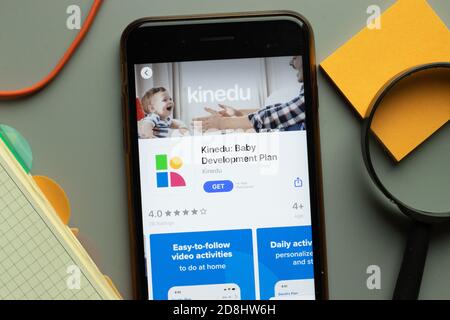 New York, USA - 26 October 2020: Kinedu Baby Development Plan mobile app logo on phone screen close up, Illustrative Editorial Stock Photo