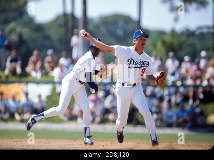 Los Angeles Dodgers Alfredo Griffin, right, tags out Cincinnati Reds Van  Snider at second base at the spring training facility in Vero Beach,  Florida on March 12, 1989. Photo by Francis Specker