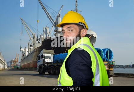 Engineers operating a cnc machine in factory Stock Photo