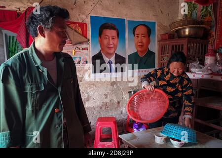 Portraits of Xi Jinping and Mao Zedong seen pasted at a home of elderly people in Anhui.Many people in China are very respectful to Xi Jinping and Mao Zedong. Especially in the countryside, people are willing to post pictures of Xi Jinping and Mao Zedong at home as a respect to the country's leaders. Stock Photo