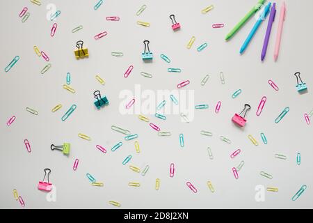 rainbow office supplies flat lay on white background Stock Photo