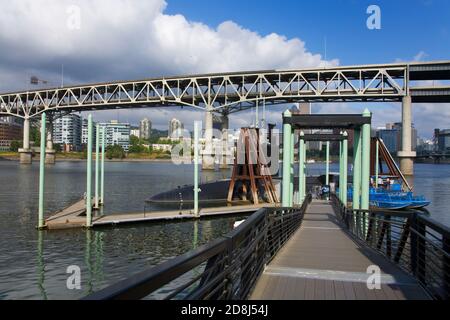 Marquam Bridge over the Willamette River and the U.S. Submarine Blueback at the OMSI Museum in Portland, Oregon, USA Stock Photo