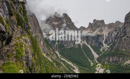 Dolomites, Brenta. Beautiful foggy day in cold summer day in Moveno, Italy Stock Photo