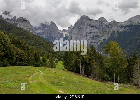 Dolomites, Brenta. Beautiful foggy day in cold summer day in Moveno, Italy Stock Photo