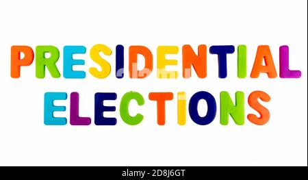 Text PRESIDENTIAL ELECTIONS written in plastic letters on a white background. Concept for the electoral campaign. Stock Photo