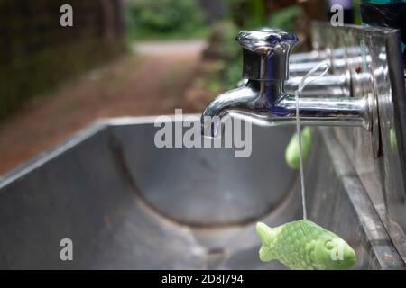 Water taps placed in public places to break the chain of COVID19 spread. From Kerala, India Stock Photo